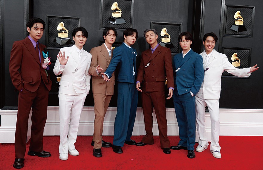 bts BTS performing live in front of a global audience, symbolizing the global reach of Hallyu