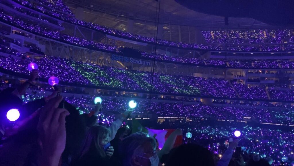 BTS concert BTS performing on stage with thousands of global fans—symbolizing the global reach of K-POP.